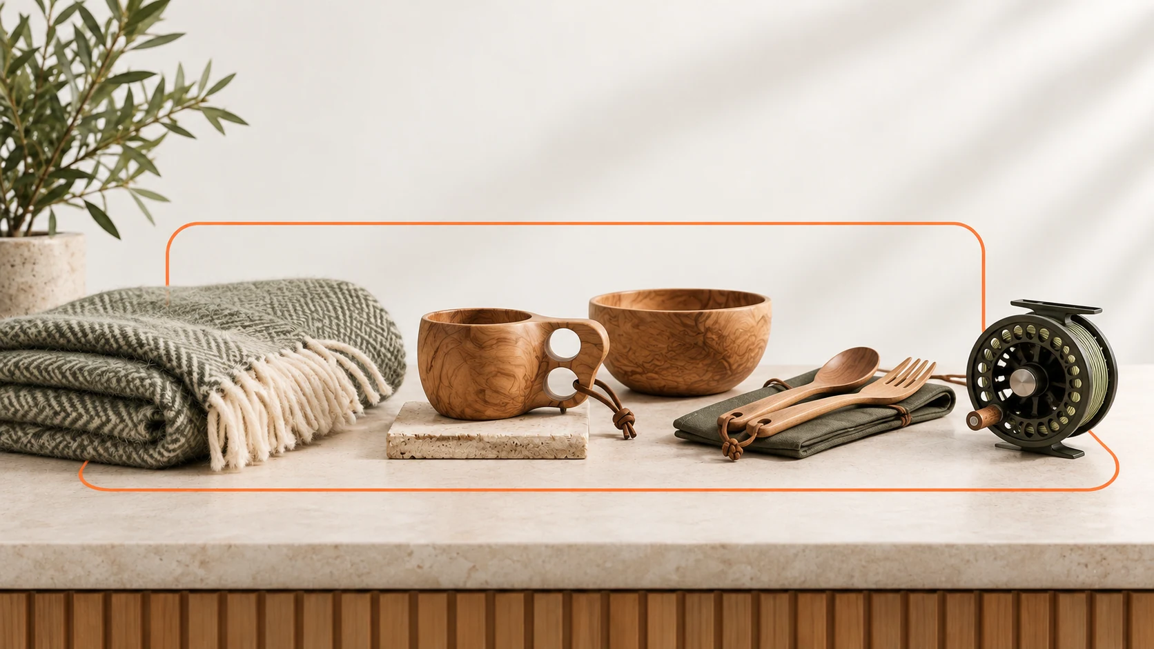 Wooden camping tableware, a wool blanket and fishing equipment